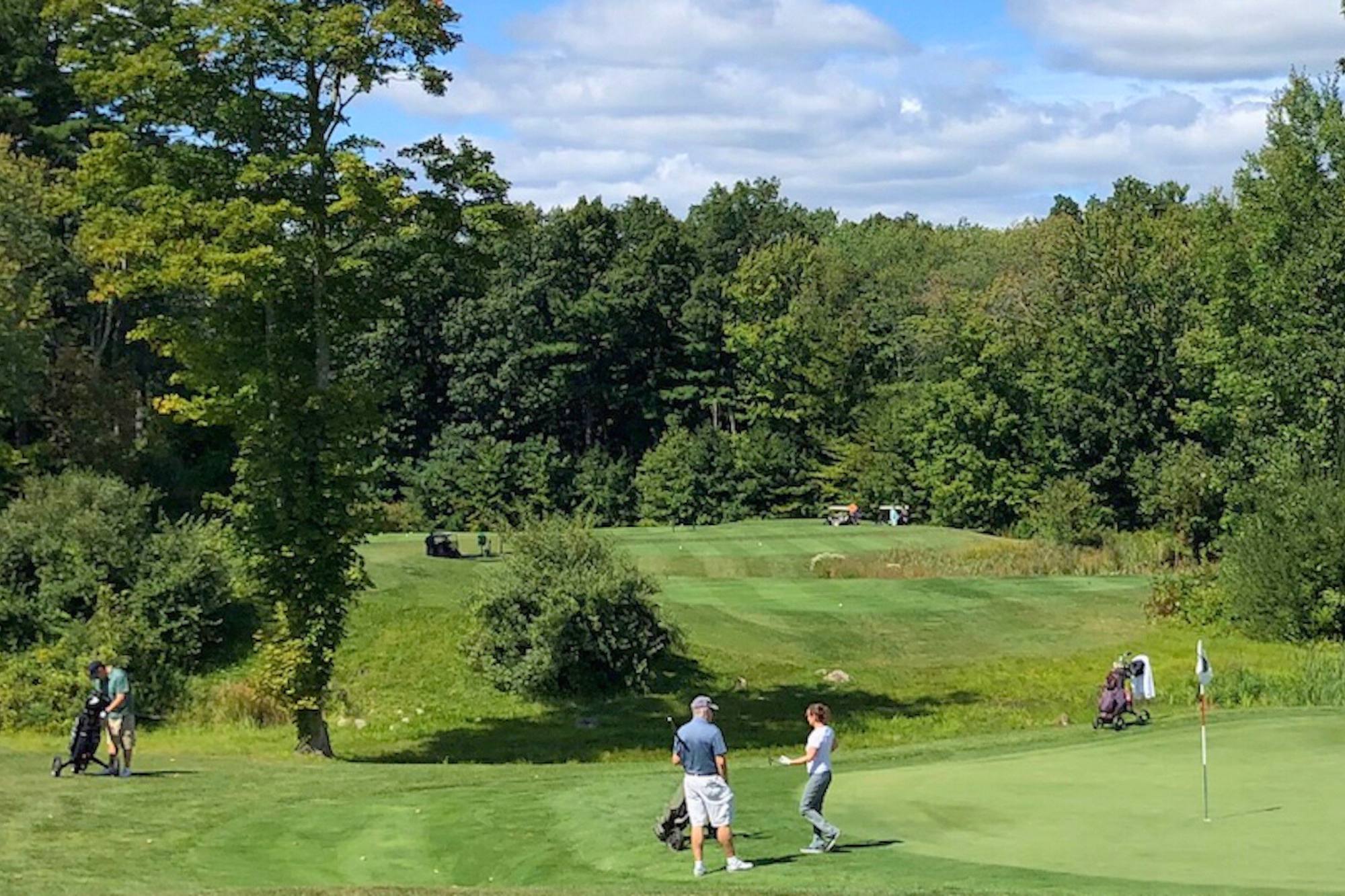 golfers at the links hole seven