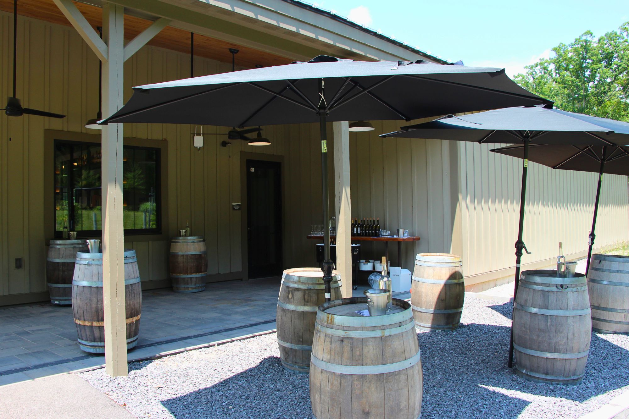 the tasting room at labelle winery outdoor terrace set up for wine tastings